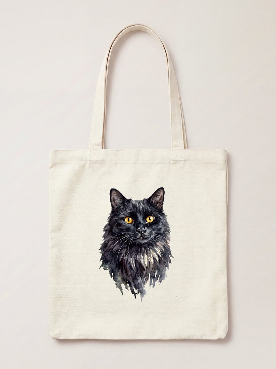 A watercolour portrait of a long haired black cat with amber eyes, printed on a natural cotton tote bag