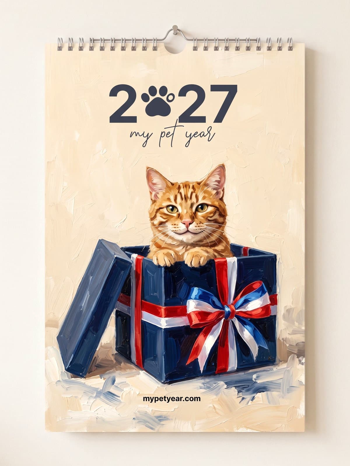 Painted Pet Calendar on a wall, cover with a ginger cat peeking out of a gift box