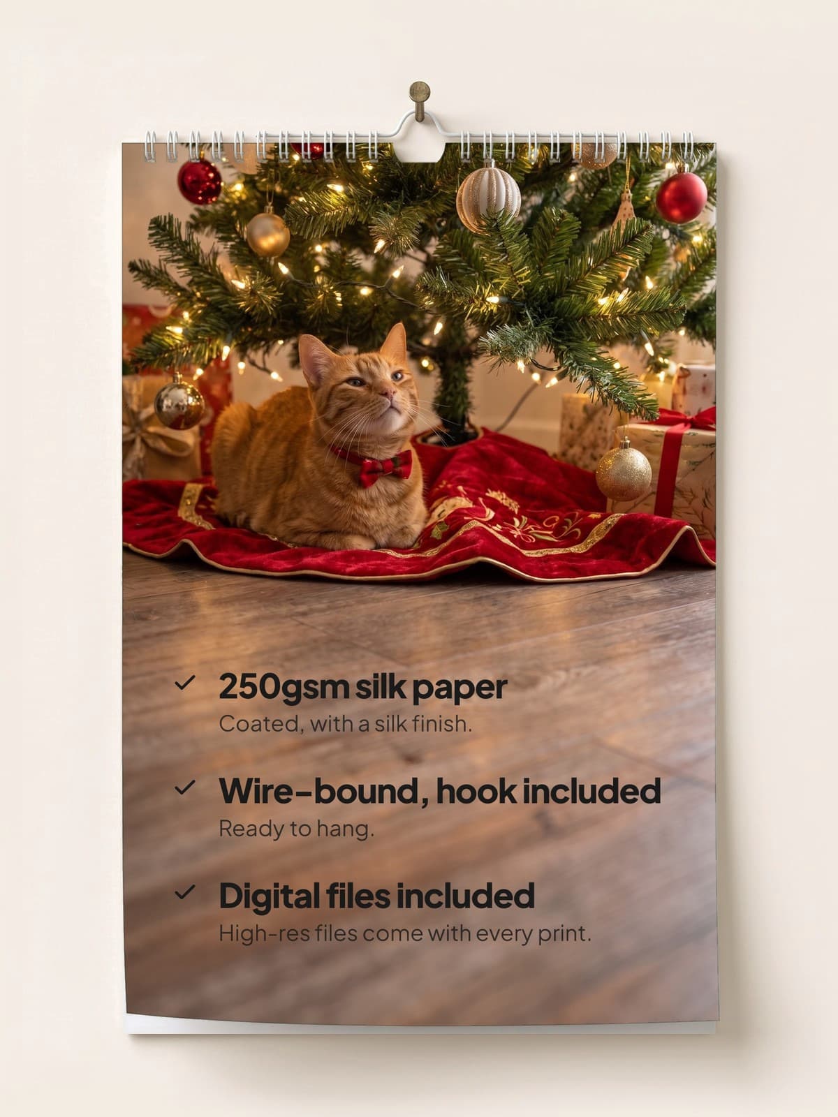 The calendar hanging on a wall: 250gsm silk paper, wire-bound with a hook, digital files included